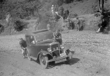 Austin 10 saloon at the Mid Surrey AC Barnstaple Trial, Beggars Roost, Devon, 1934. Artist: Bill Brunell