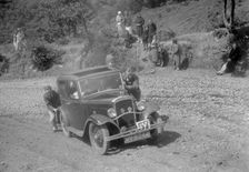 Austin 10 saloon at the Mid Surrey AC Barnstaple Trial, Beggars Roost, Devon, 1934. Artist: Bill Brunell