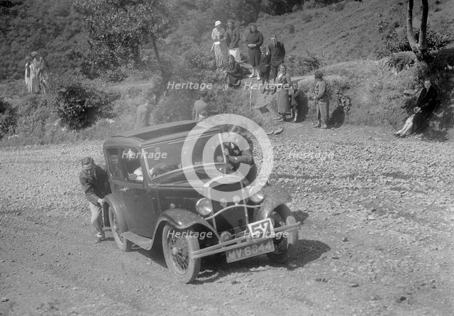 Austin 10 saloon at the Mid Surrey AC Barnstaple Trial, Beggars Roost, Devon, 1934. Artist: Bill Brunell.