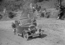 Austin 10 saloon at the Mid Surrey AC Barnstaple Trial, Beggars Roost, Devon, 1934. Artist: Bill Brunell