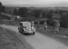 Austin 10 saloon of WS Sewell competing in the South Wales Auto Club Welsh Rally, 1937 Artist: Bill Brunell
