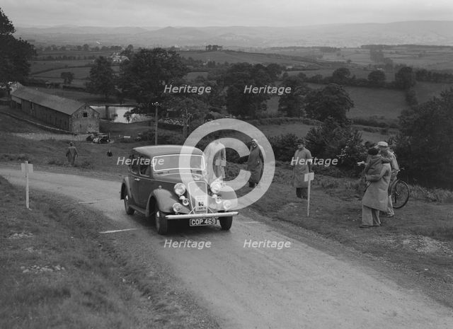 Austin 10 saloon of WS Sewell competing in the South Wales Auto Club Welsh Rally, 1937 Artist: Bill Brunell.