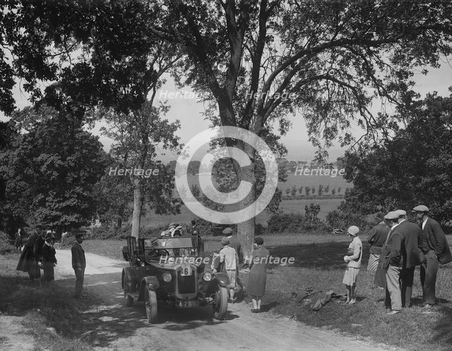 Austin 12/4 open 4-seater tourer competing in the JCC Inter-Centre Rally, 1932. Artist: Bill Brunell.
