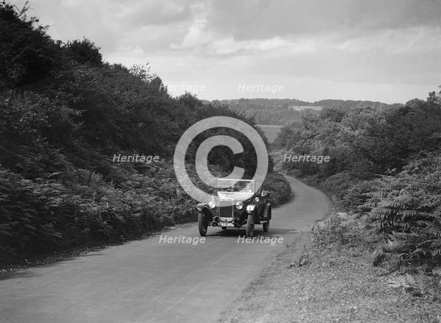 Austin 12/4 taking part in a First Aid Nursing Yeomanry trial or rally, 1931. Artist: Bill Brunell.