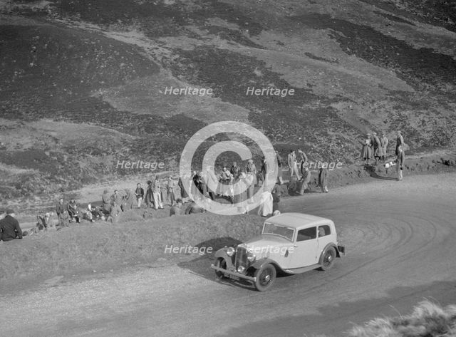 Austin 12/6 of JW Flewitt at the RSAC Scottish Rally, Devil's Elbow, Glenshee, 1934. Artist: Bill Brunell.