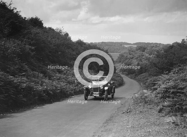Austin 12/4 taking part in a First Aid Nursing Yeomanry trial or rally, 1931. Artist: Bill Brunell.