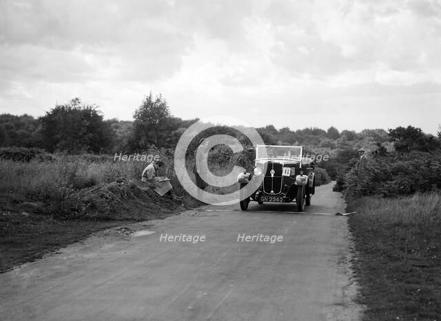 Austin 12/4 taking part in a First Aid Nursing Yeomanry trial or rally, 1931. Artist: Bill Brunell.