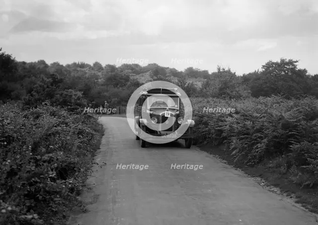 Austin 20 taking part in a First Aid Nursing Yeomanry trial or rally, 1931. Artist: Bill Brunell.