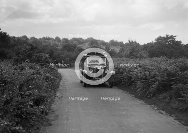 Austin 20 taking part in a First Aid Nursing Yeomanry trial or rally, 1931. Artist: Bill Brunell.