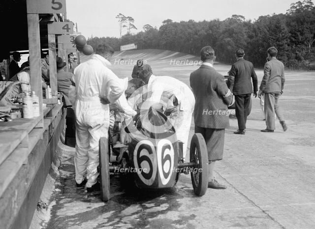 Austin 747 cc car of Charles Goodacre retired from the BRDC 500 Miles Race, Brooklands, 1931. Artist: Bill Brunell.