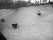 Austin 7 and the spinning Riley of HL Roberts, BARC Mountain Race, Brooklands, Surrey, 1931 Artist: Bill Brunell