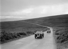 Austin 7 AEW of AL Chard ahead of FG Cornish's MG TA at the MCC Torquay Rally, July 1937. Artist: Bill Brunell
