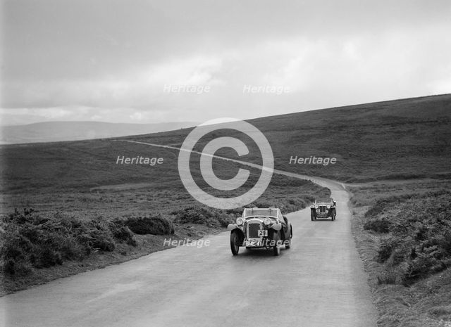 Austin 7 AEW of AL Chard ahead of FG Cornish's MG TA at the MCC Torquay Rally, July 1937. Artist: Bill Brunell.