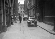 Austin 7 at a motor vehicle blessing ceremony. Artist: Bill Brunell
