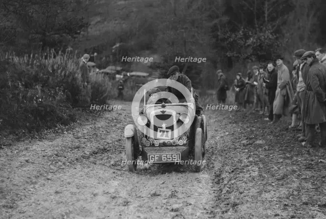Austin 7 Boyd Carpenter 2-seater sports of E Stockvis taking part in the Inter-Varsity Trial, 1930. Artist: Bill Brunell.