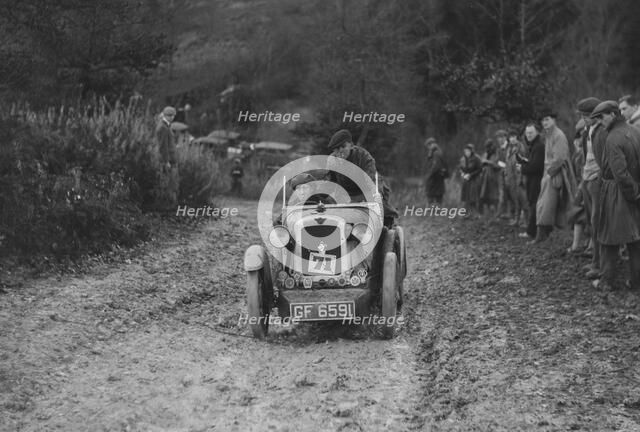 Austin 7 Boyd Carpenter 2-seater sports of E Stockvis taking part in the Inter-Varsity Trial, 1930. Artist: Bill Brunell.