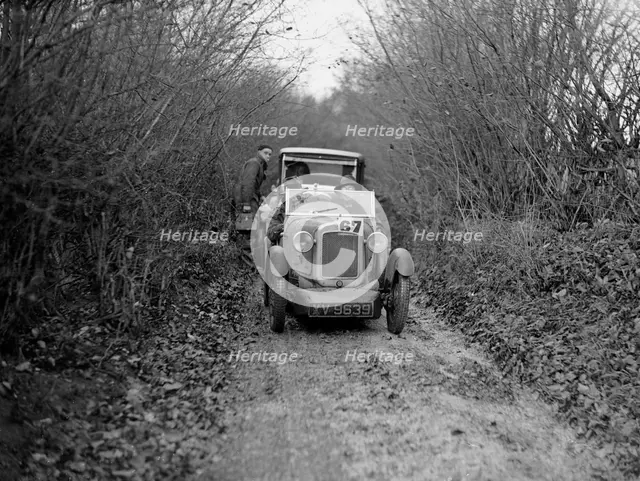 Austin 7 Boyd Carpenter 2-seater sports of GBL Willis taking part in the Inter-Varsity Trial, 1930. Artist: Bill Brunell.