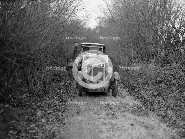 Austin 7 Boyd Carpenter 2-seater sports of GBL Willis taking part in the Inter-Varsity Trial, 1930. Artist: Bill Brunell.