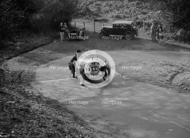 Austin 7 Gordon England Cup competing in the JCC Half-Day Trial, 1930. Artist: Bill Brunell.