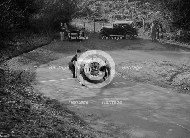 Austin 7 Gordon England Cup competing in the JCC Half-Day Trial, 1930. Artist: Bill Brunell.