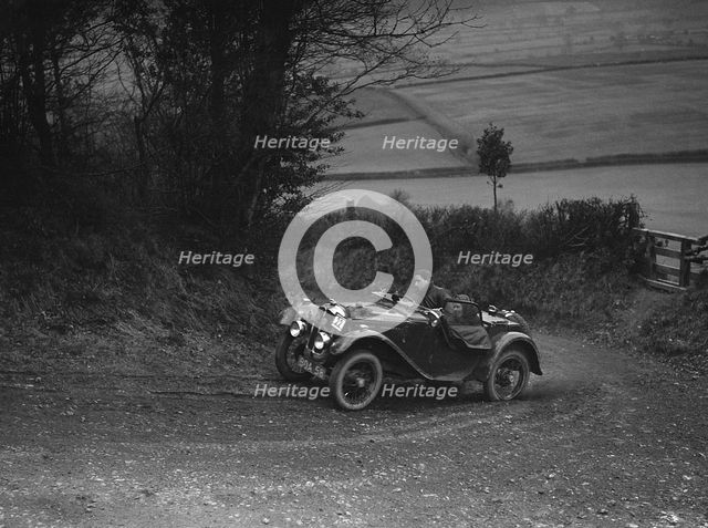 Austin 7 Grasshopper of CD Buckley competing at the MG Car Club Midland Centre Trial, 1938. Artist: Bill Brunell.
