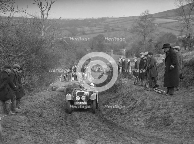 Austin 7 Grasshopper of Alf Langley competing at the MG Car Club Midland Centre Trial, 1938. Artist: Bill Brunell.