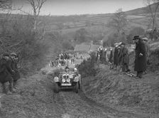 Austin 7 Grasshopper of Alf Langley competing at the MG Car Club Midland Centre Trial, 1938. Artist: Bill Brunell