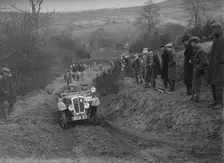 Austin 7 Grasshopper of WH Scriven competing in the MG Car Club Midland Centre Trial, 1938. Artist: Bill Brunell