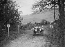 Austin 7 Grasshopper of WH Scriven competing in the MG Car Club Midland Centre Trial, 1938. Artist: Bill Brunell