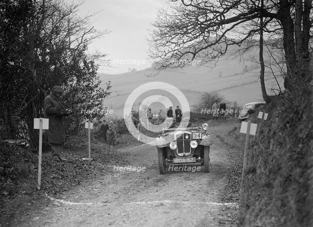 Austin 7 Grasshopper of WH Scriven competing in the MG Car Club Midland Centre Trial, 1938. Artist: Bill Brunell.