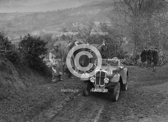 Austin 7 Grasshopper of TH Cole competing in the MG Car Club Midland Centre Trial, 1938. Artist: Bill Brunell.