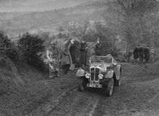 Austin 7 Grasshopper of TH Cole competing in the MG Car Club Midland Centre Trial, 1938. Artist: Bill Brunell