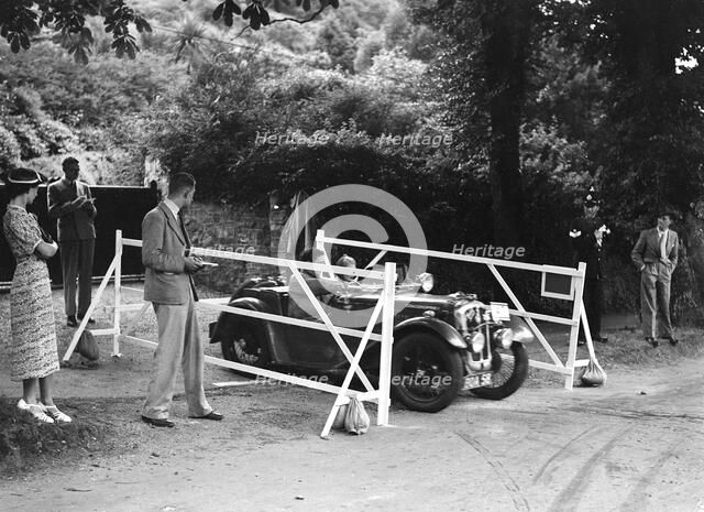 Austin 7 of CD Buckley, winner of a premier award at the MCC Torquay Rally, July 1937. Artist: Bill Brunell.