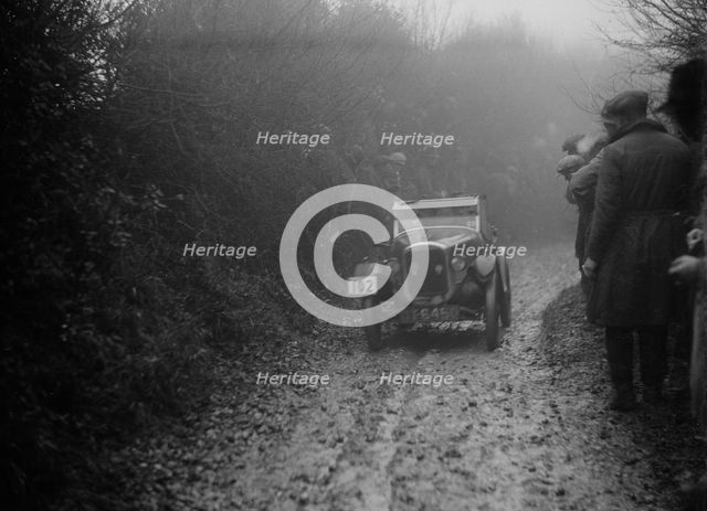 Austin 7 of HC Jacobs competing in the MCC Exeter Trial, Meerhay, Dorset, 1930. Artist: Bill Brunell.