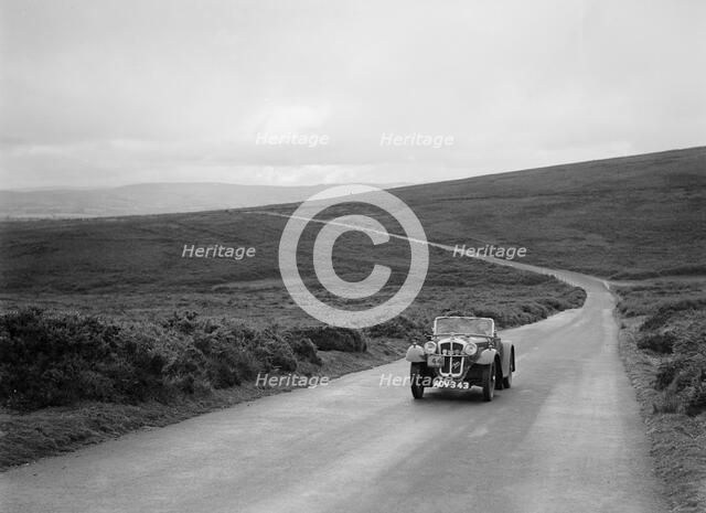 Austin 7 of JG Orford, winner of a premier award at the MCC Torquay Rally, July 1937. Artist: Bill Brunell.