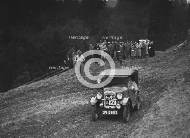 Austin 7 of L Hyland competing in the MCC Edinburgh Trial, Roxburghshire, Scotland, 1938. Artist: Bill Brunell.