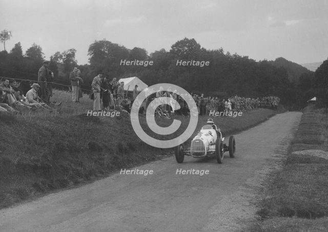 Austin 7 of LP Driscoll competing in the MAC Shelsley Walsh Speed Hill Climb, Worcestershire, 1935. Artist: Bill Brunell.