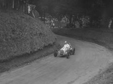 Austin 7 of LP Driscoll competing in the MAC Shelsley Walsh Speed Hill Climb, Worcestershire, 1935. Artist: Bill Brunell