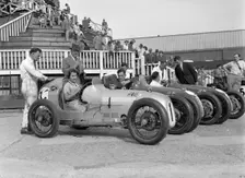Austin 7 works team, Brooklands 1937. Artist: Bill Brunell