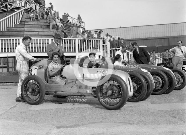Austin 7 works team, Brooklands 1937. Artist: Bill Brunell.