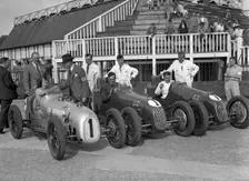 Austin 7 works team, Brooklands 1937. Artist: Bill Brunell