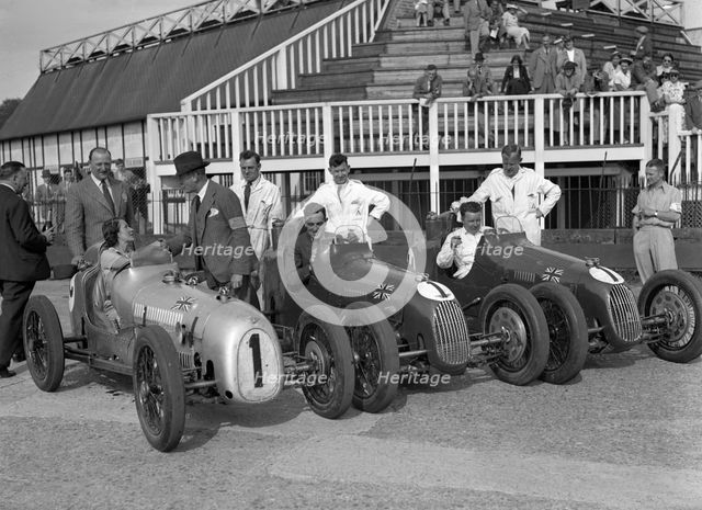 Austin 7 works team, Brooklands 1937. Artist: Bill Brunell.