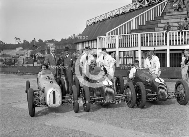 Austin 7 works team, Brooklands 1937. Artist: Bill Brunell.