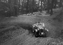 Austin 7 with Arrow body, B&HMC Brighton-Beer Trial, Fingle Bridge Hill, Devon, 1934. Artist: Bill Brunell