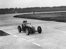 Austin 7 twin cam racing single seater on the Campbell Circuit, Brooklands. Artist: Bill Brunell