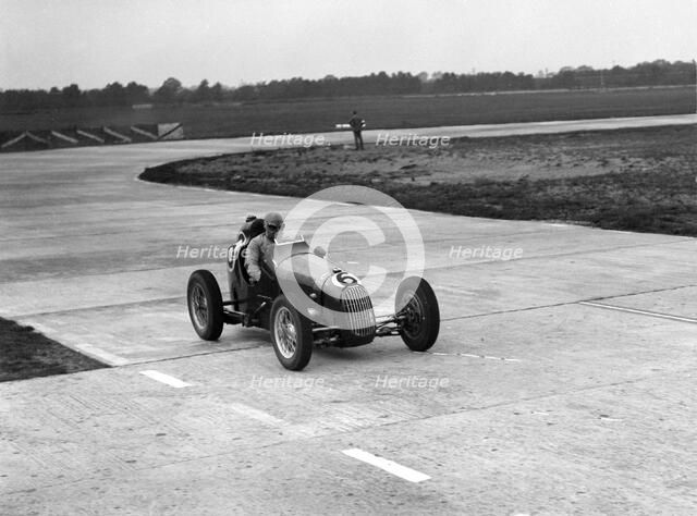 Austin 7 twin cam racing single seater on the Campbell Circuit, Brooklands. Artist: Bill Brunell.