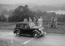 Austin Cambridge saloon of T Norton competing in the South Wales Auto Club Welsh Rally, 1937 Artist: Bill Brunell