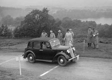 Austin Cambridge saloon of T Norton competing in the South Wales Auto Club Welsh Rally, 1937 Artist: Bill Brunell