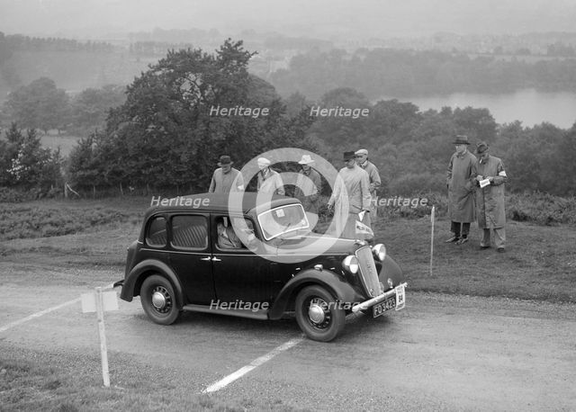 Austin Cambridge saloon of T Norton competing in the South Wales Auto Club Welsh Rally, 1937 Artist: Bill Brunell.