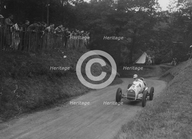 Austin competing in the Shelsley Walsh Amateur Hillclimb, Worcestershire, 1929. Artist: Bill Brunell.